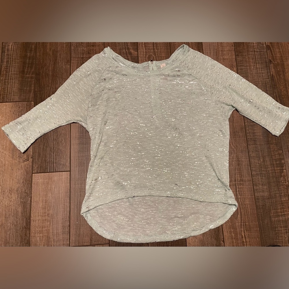 Teal sweater with quarter sleeves. The size is XL 14/16 plus size.